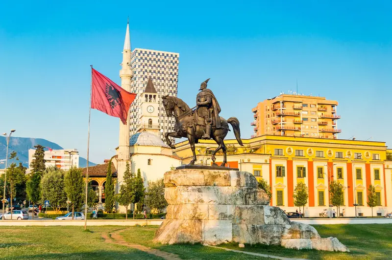 Skanderbeg square with flag skanderbeg monument and the et hem bey mosque in the center of tirana city albania jpg